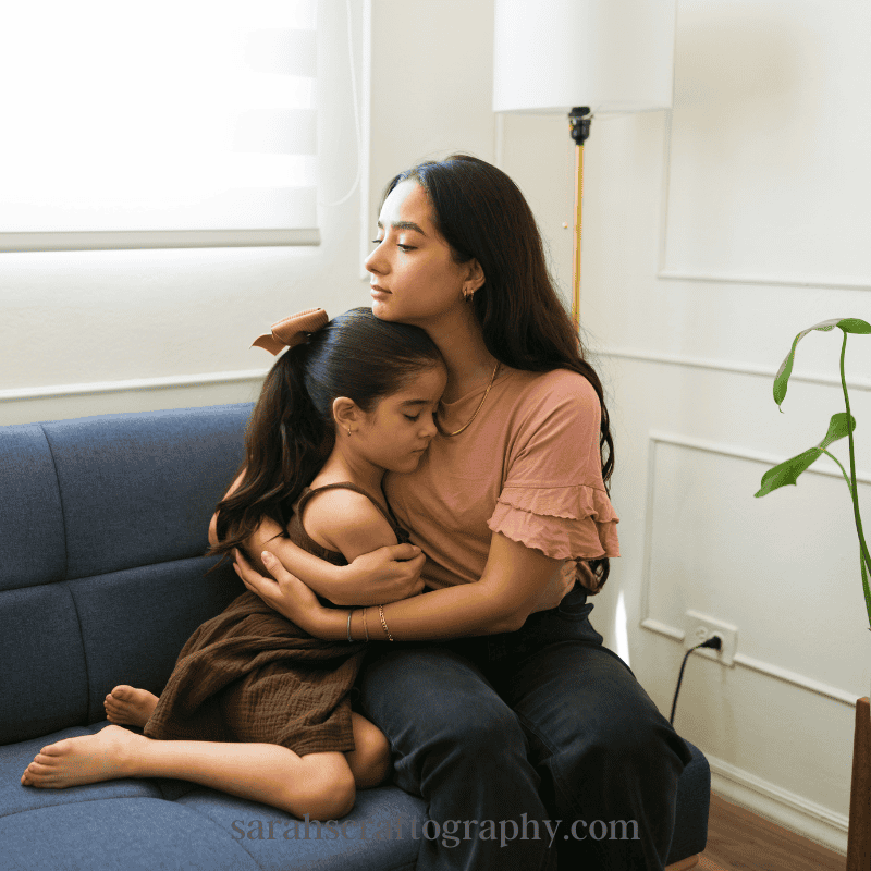 Woman dealing with social pressure and judgment surrounding domestic violence